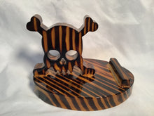 Load image into Gallery viewer, Skull/Crossbones Cell Phone Stand